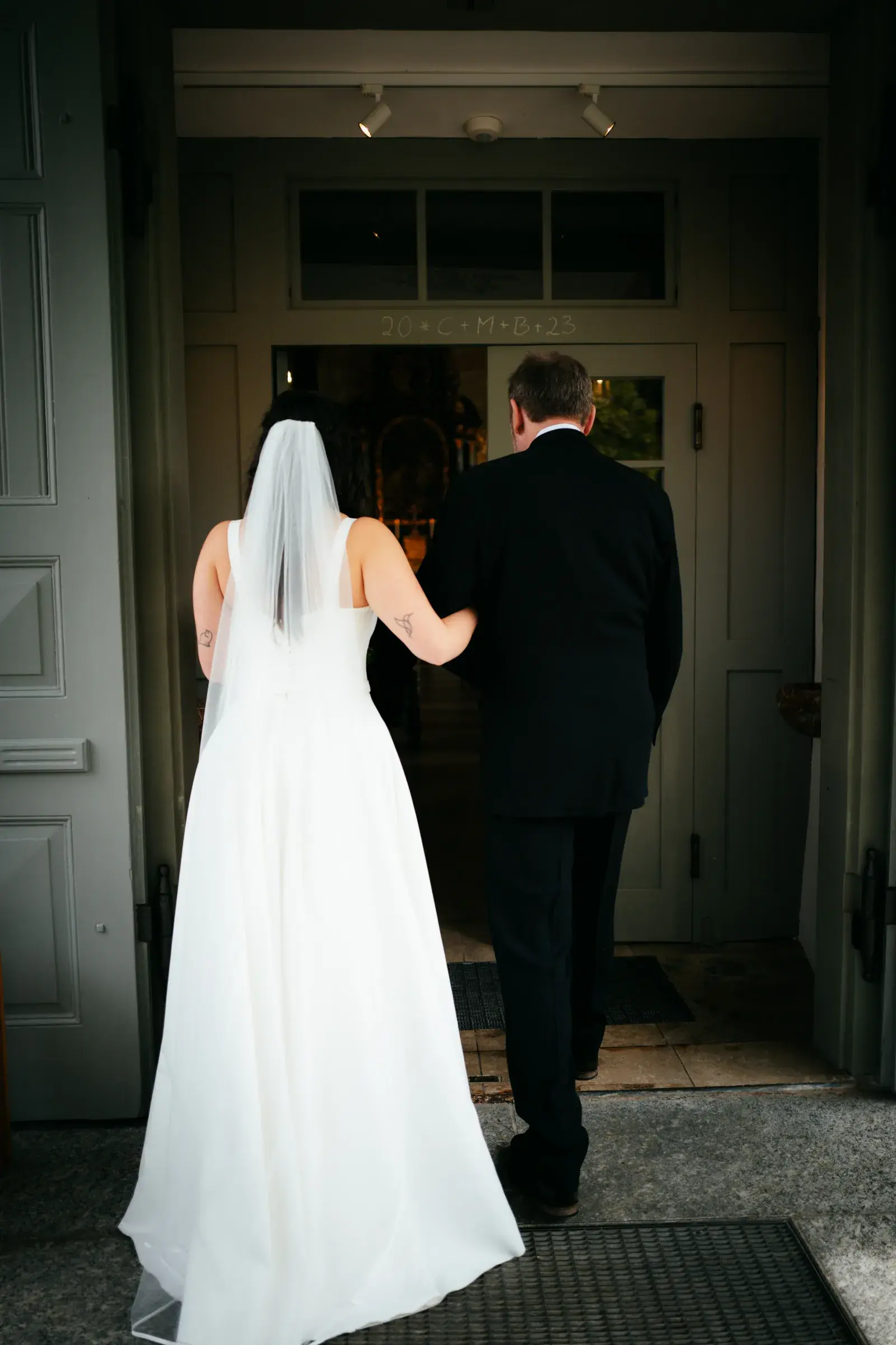 An emotional wedding moment photographed by Cori Kasus