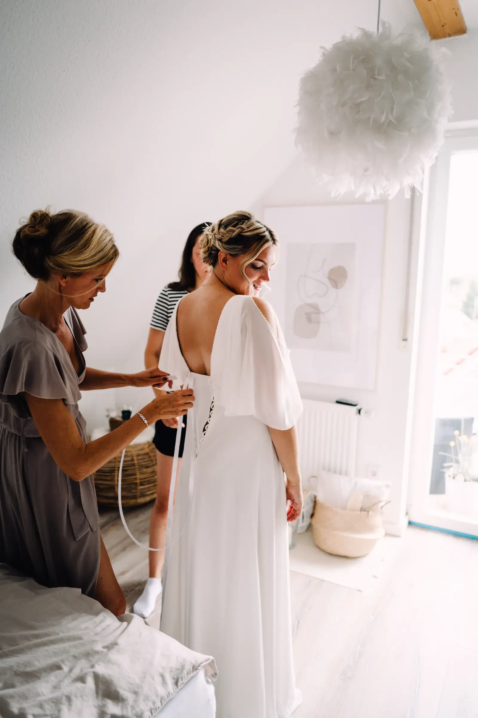 An emotional wedding moment photographed by Cori Kasus